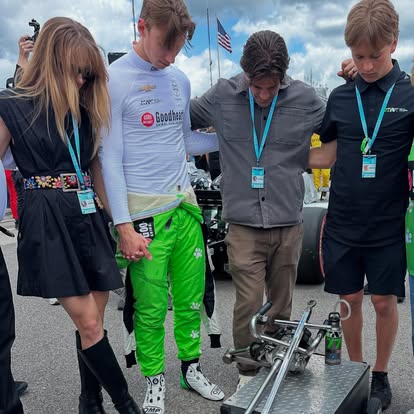 People gathered at a motorsports event